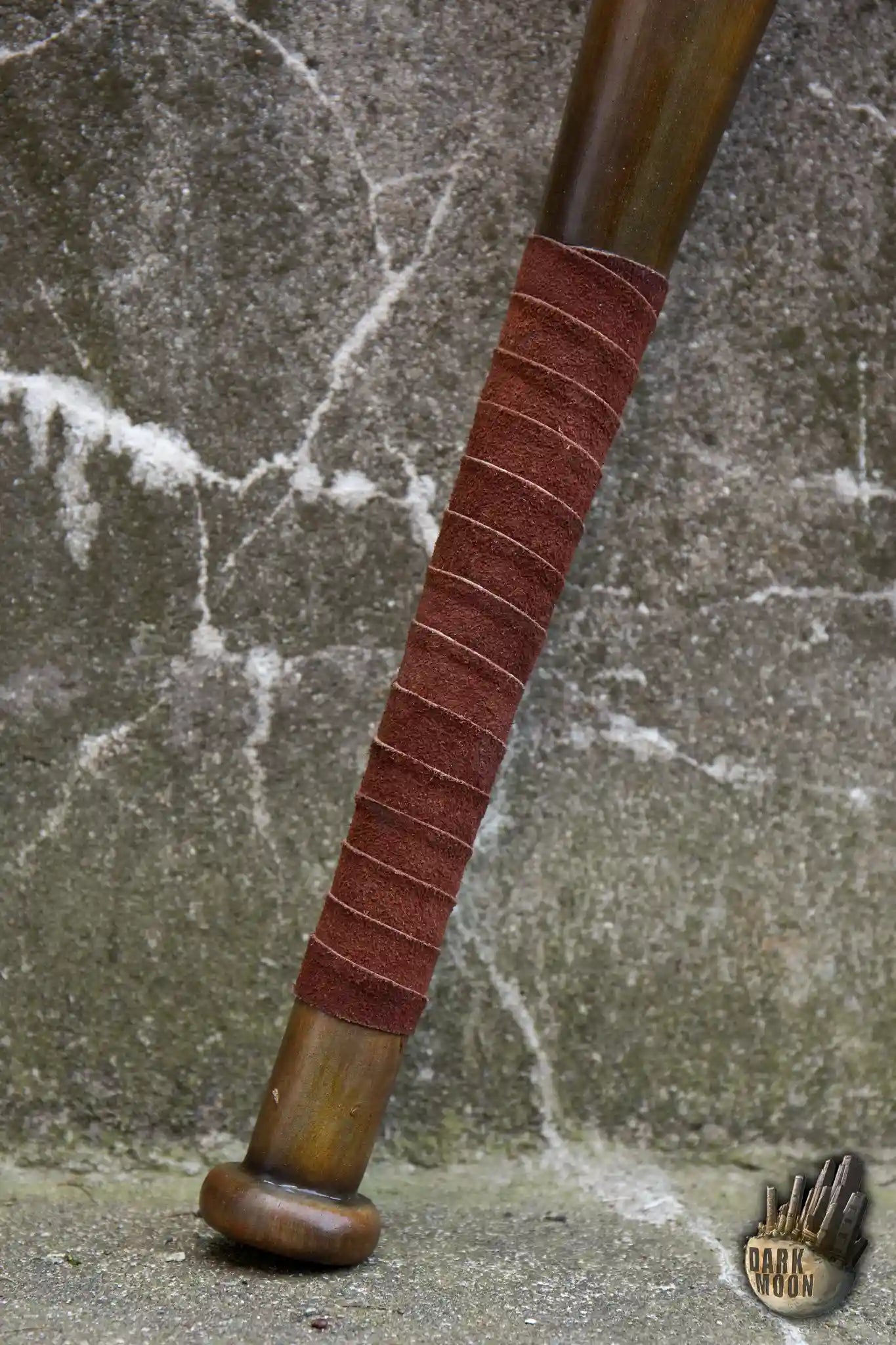 Barbed Wire Bat with brown grip and wooden design, perfect for post-apocalyptic scenarios.