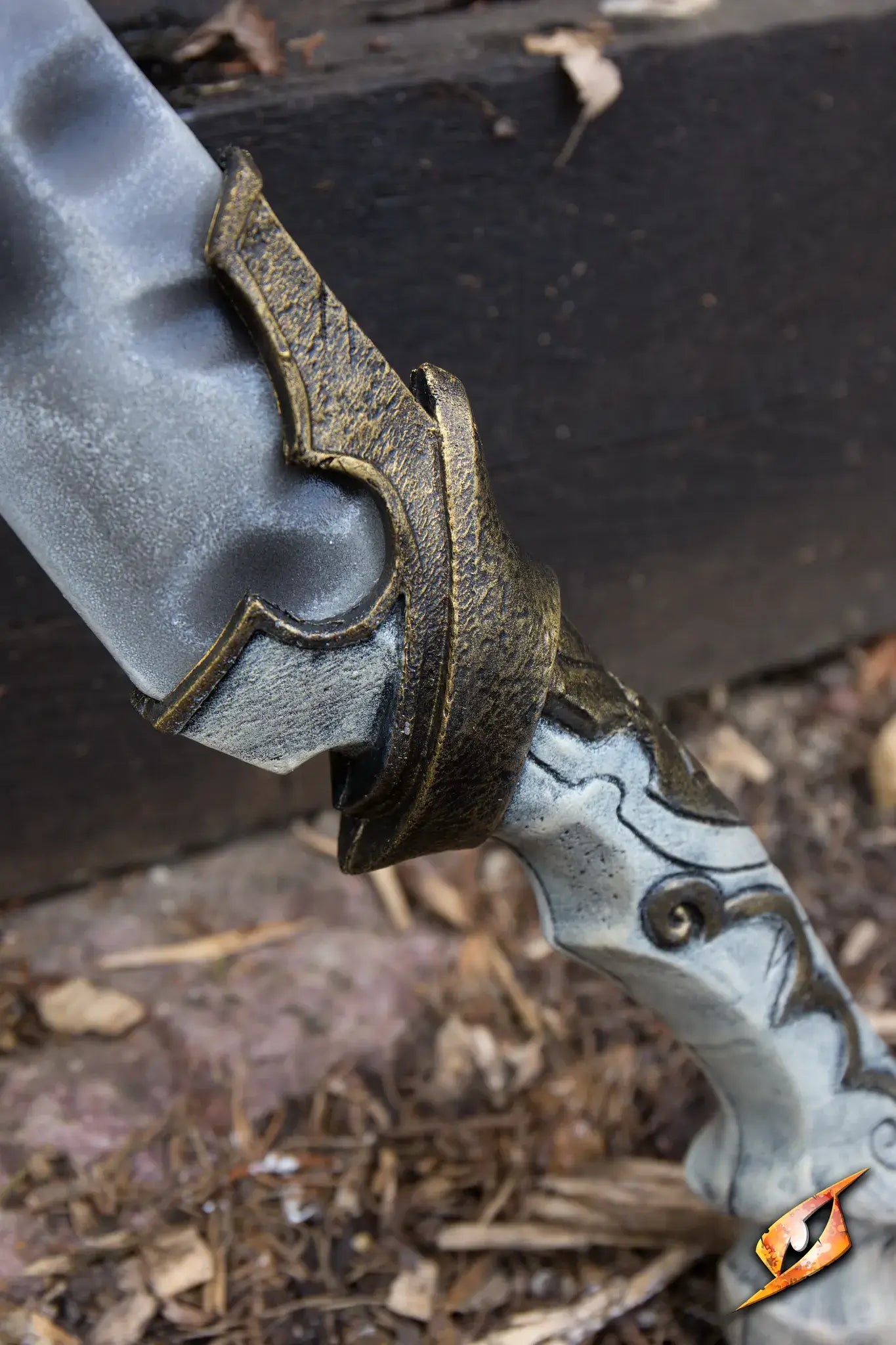 Close-up of Bone Scimitar's ornate handle and blade design showing detailed craftsmanship and unique features.