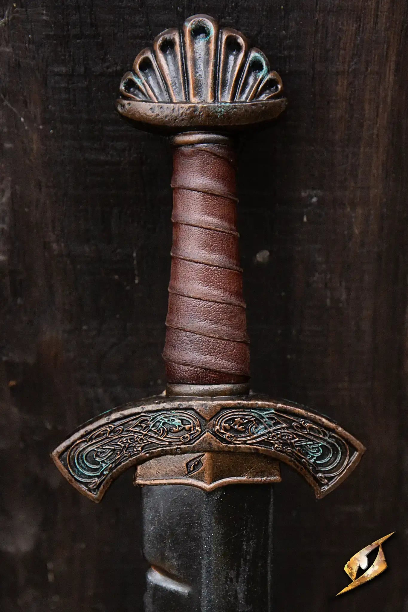 Battleworn Viking Sword with a detailed hilt design and leather-wrapped handle, showcasing its unique craftsmanship.