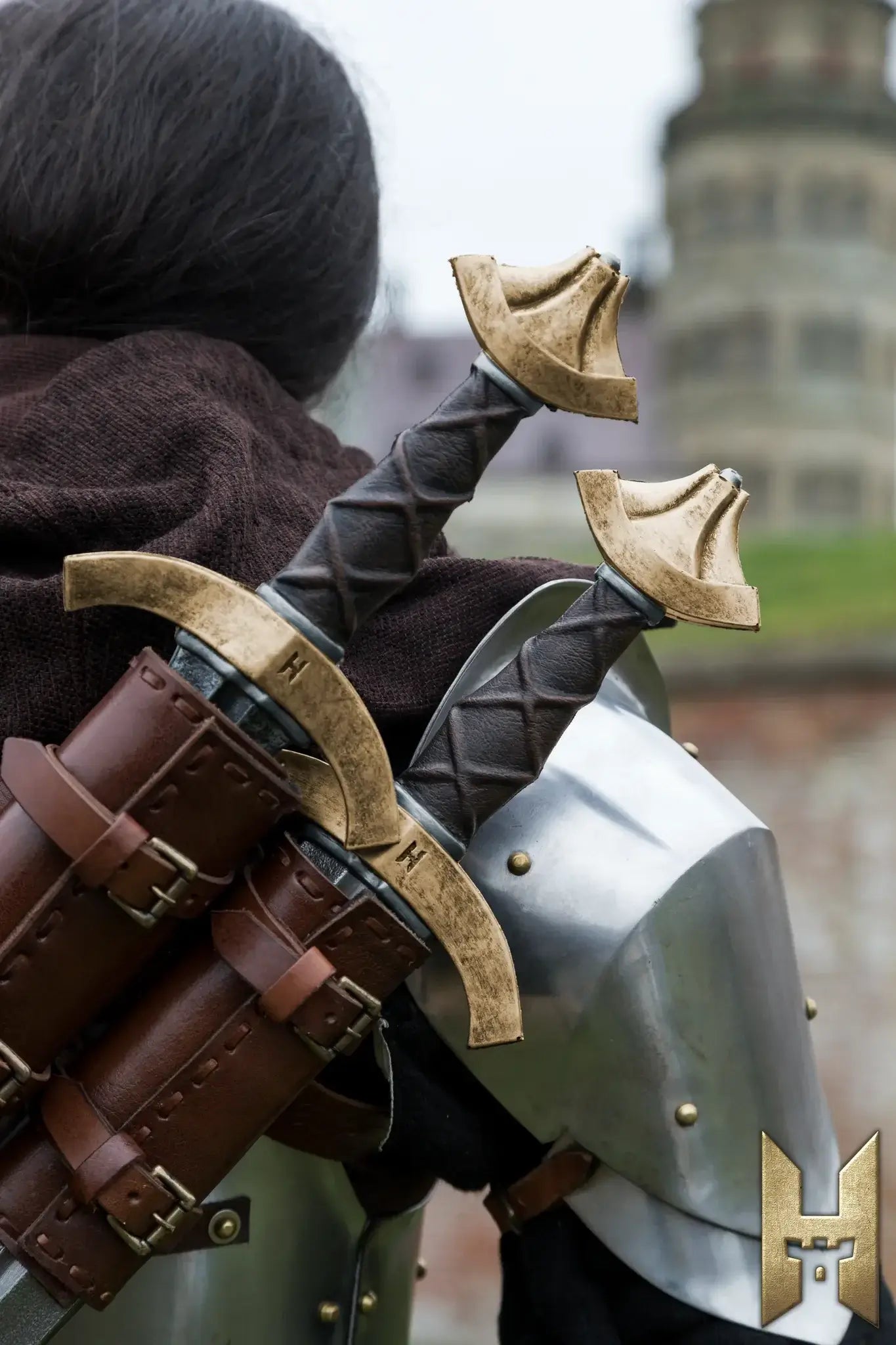 Arming Sword displayed on a character's back, showcasing detailed foam weapon design for LARP and cosplay.