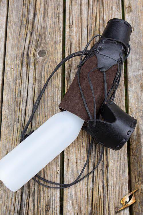 500 ml Plastic Flask for Laced Bottlehold with leather strap on wooden surface