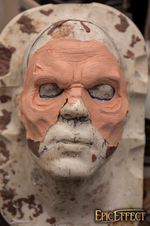 Zombie Brow latex prosthetic molded on a mask to create a rotting undead expression for costumes.