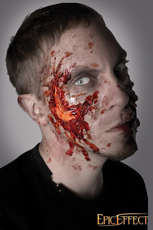 Zombie Cheekbone Exposed showcasing a gory, realistic zombie makeup effect on a man's face.