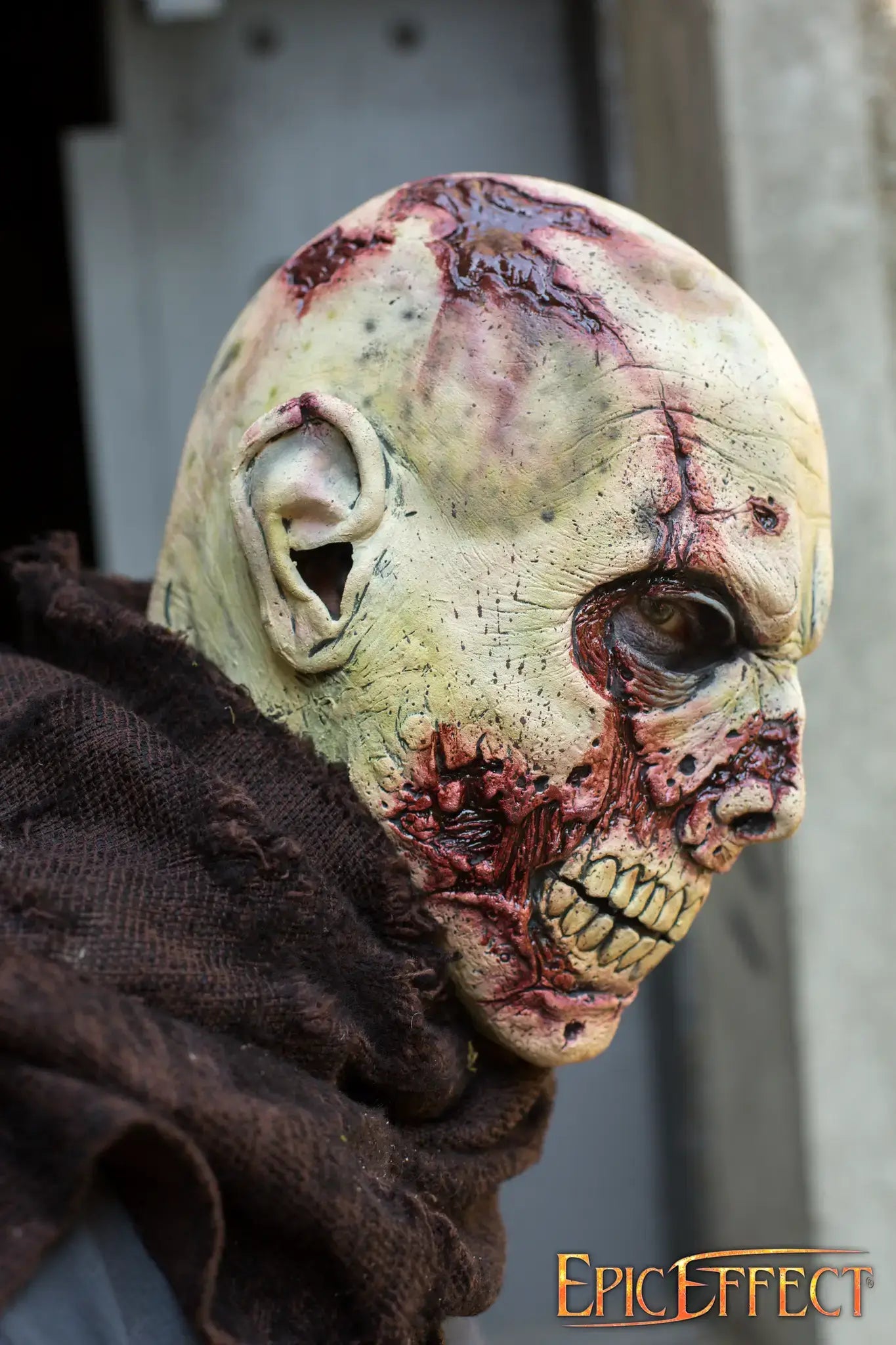 Scarface Zombie lifelike mask showcasing detailed decay and horror elements for Halloween or costume display.