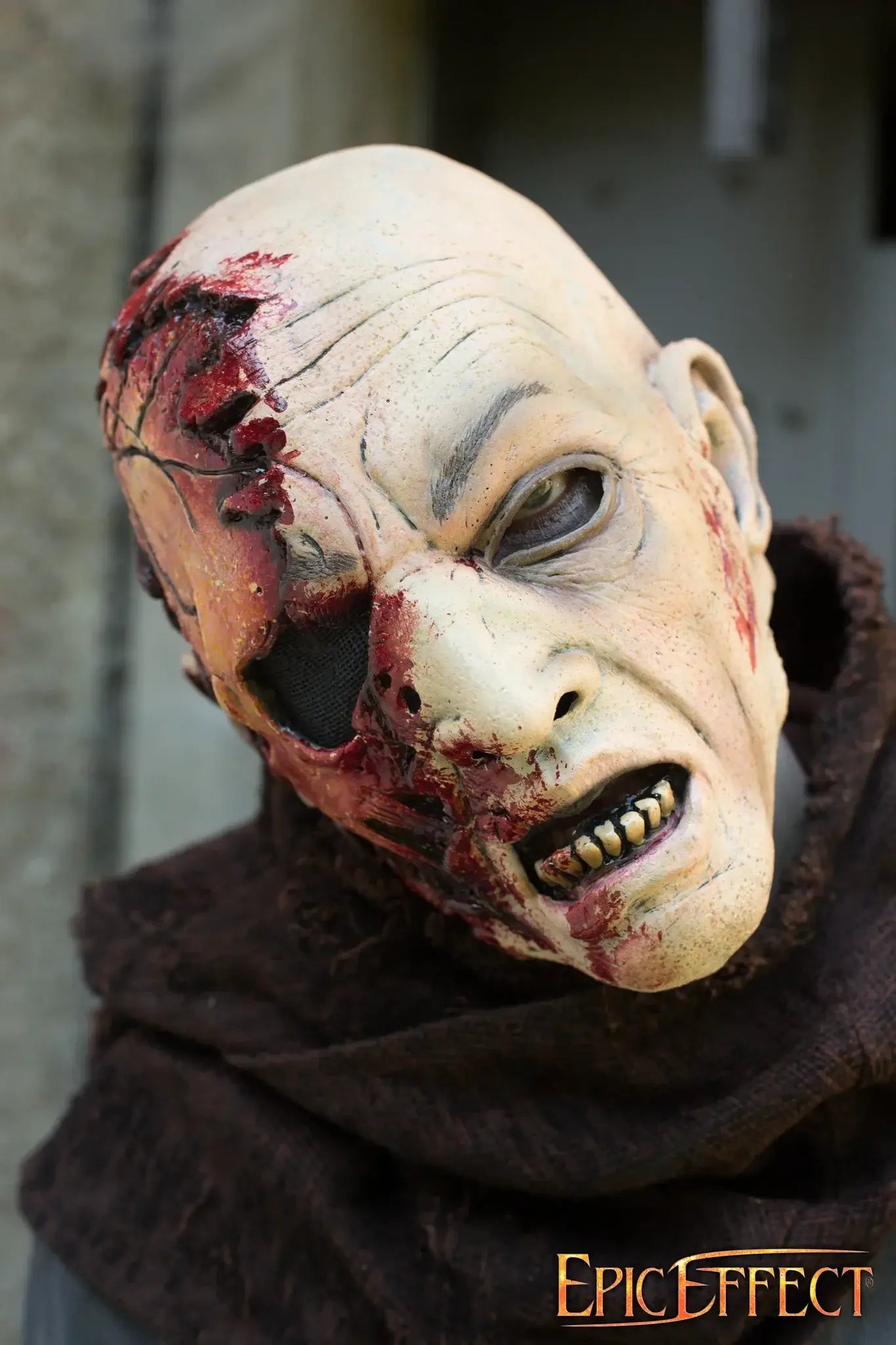 Half Face Zombie prop with grotesque features and gruesome details, perfect for Halloween decorations.
