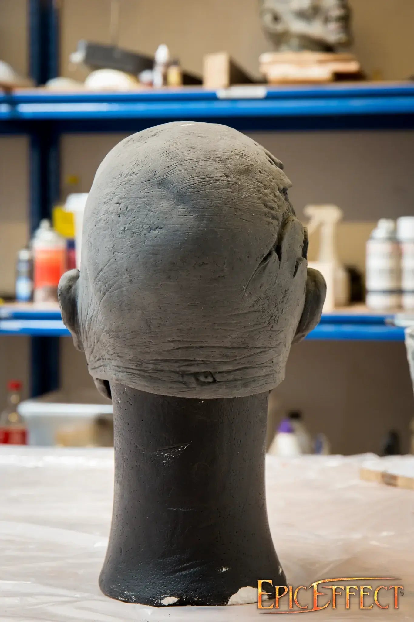 Half Face Zombie sculpture in progress with detailed texture showing the back of the head.