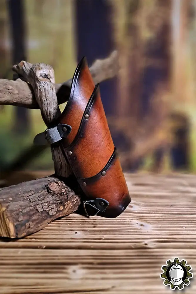 Arm Protection Jerome (Fighter) leather bracer showcasing elegance and refined design on a wooden background.