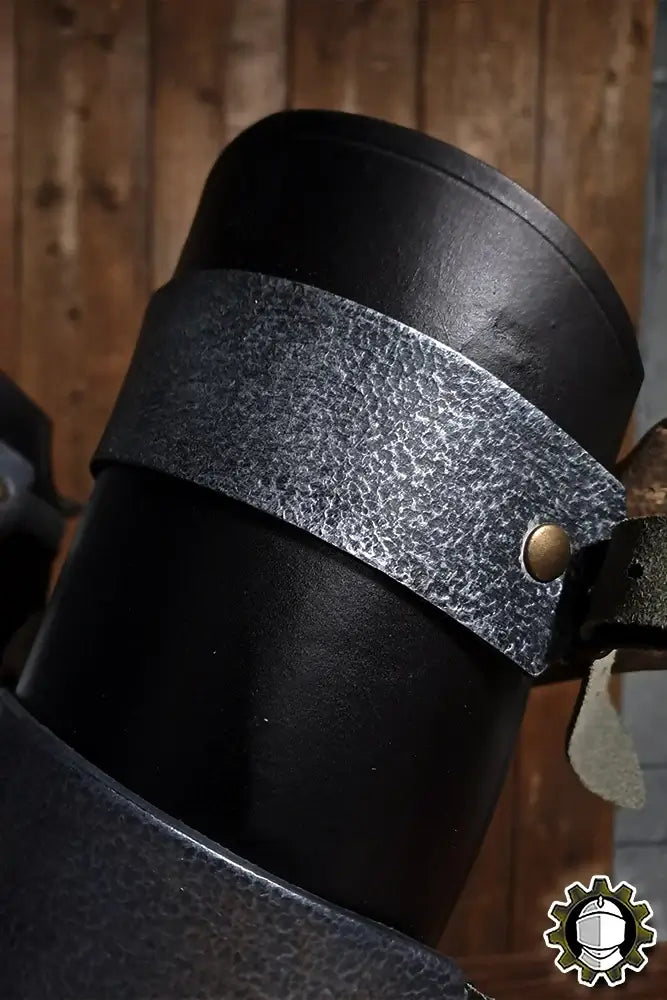 Close-up of Leg Protection Ragnall (Fighter) showing its detailed leather craftsmanship and sturdy design.