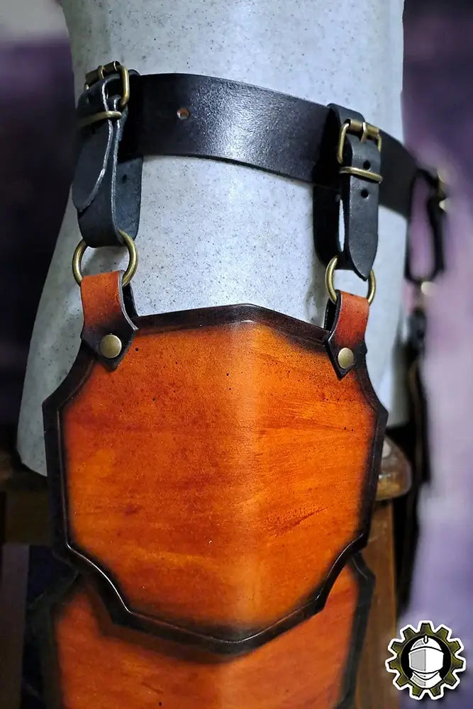 Tassets Brian (Fighter) leather armor with brown finish and black straps, designed for medieval combat.
