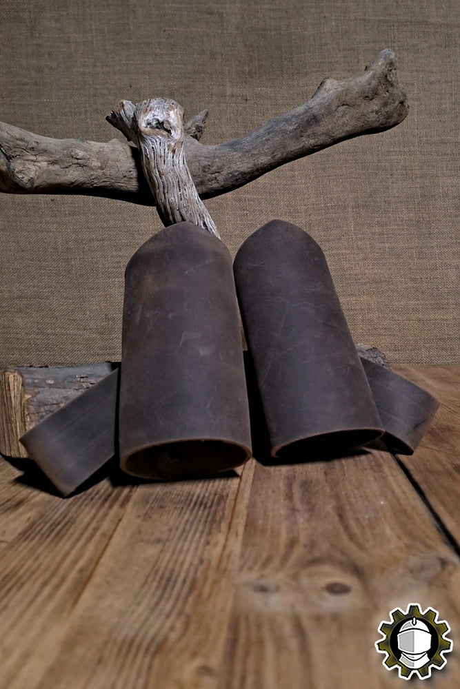 Sword Holder (New Blood) displayed on wooden surface, showcasing its elegant Crazy Horse leather design.