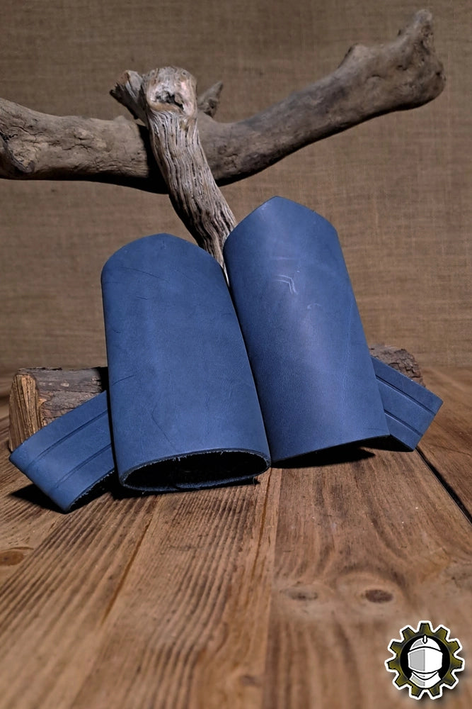 Sword Holder (New Blood) displayed on a wooden surface, showcasing its leather craftsmanship and design.