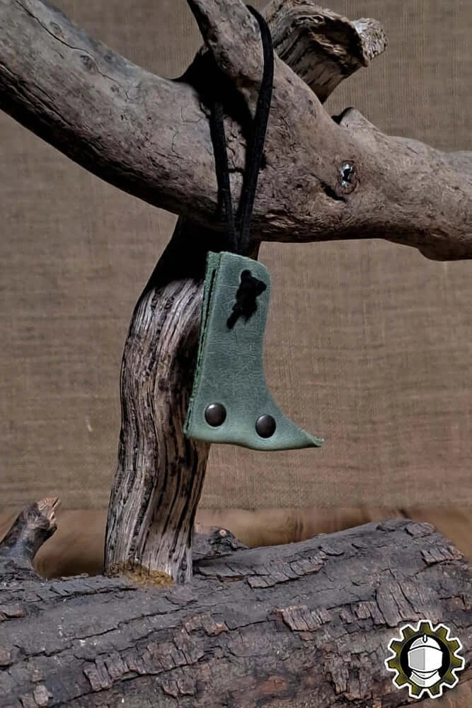 Blade Hook (New Blood) hanging on a branch, showcasing its design and function for securing weapons.