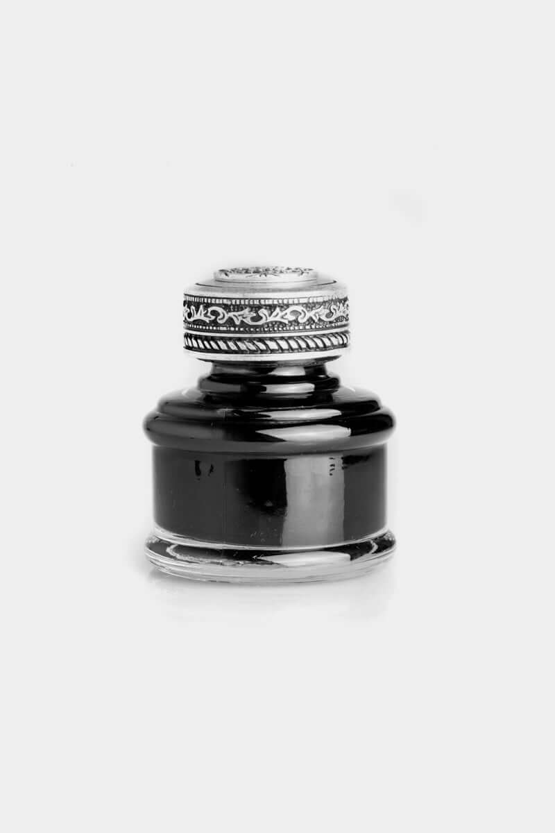 Calligraphic Writing Set inkwell with ornate silver cap and black ink, perfect for elegant writing.