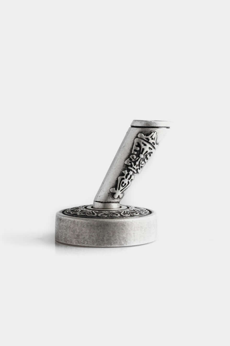 Antique silver feather holder from the Calligraphic Writing Set, featuring intricate designs and rust prevention.