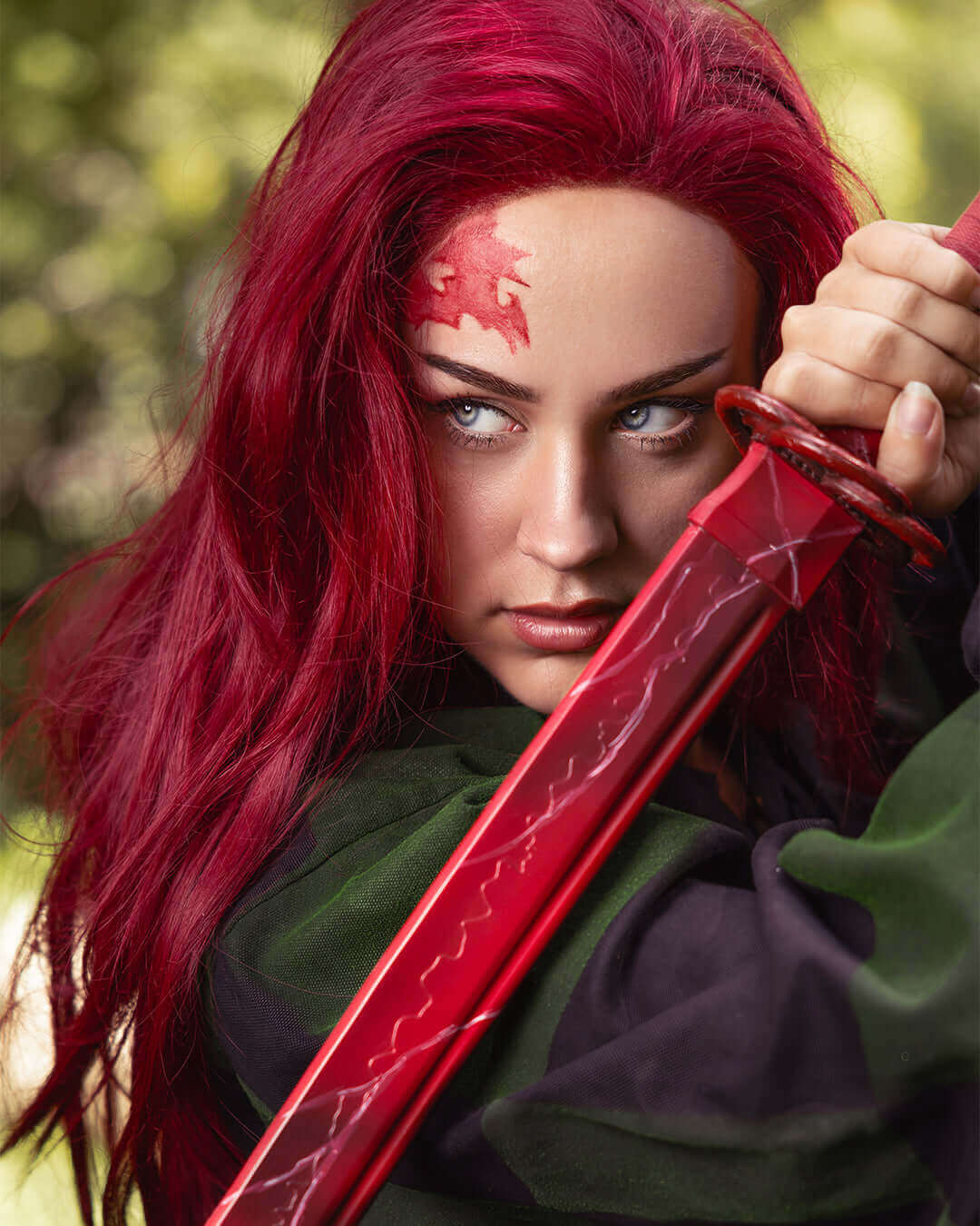 Close-up of a fierce warrior with vibrant red hair and a striking sword, embodying strength and determination.