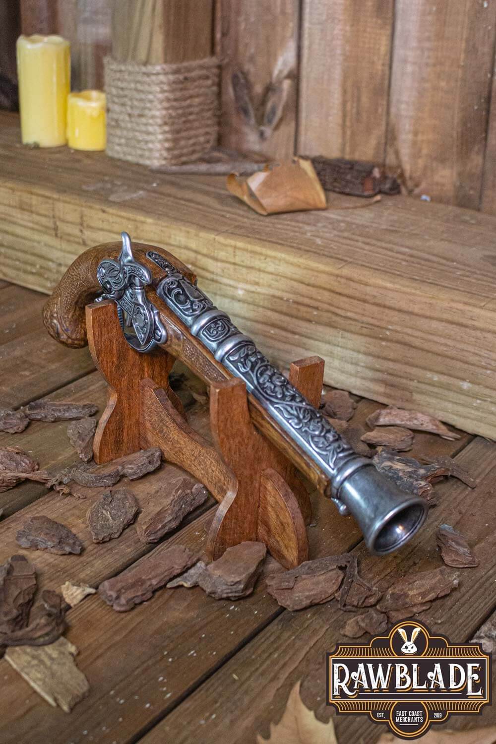 Thunder Gun displayed on a wooden stand, showcasing its ornate design and robust materials at Rawblade.