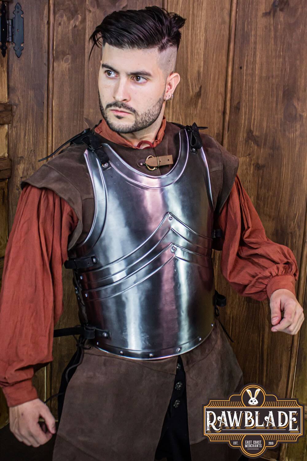 Alonso Cuirass featuring layered iron armor with leather straps and buckles worn by a model.
