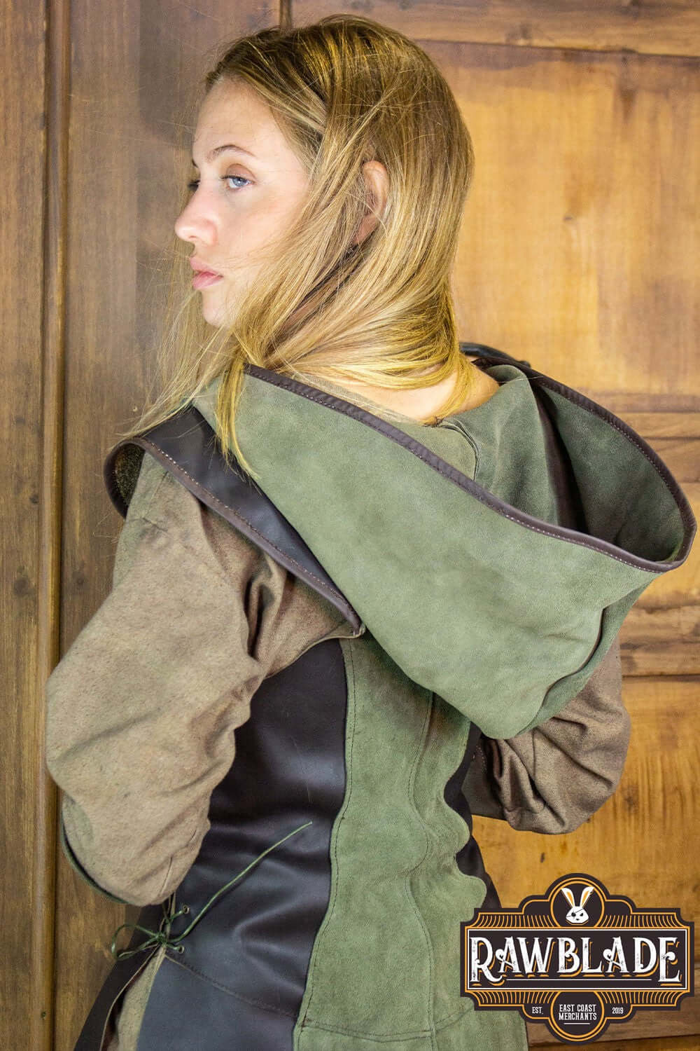 Arylith Archer Leather Tunic showcasing its elegant design and wide hood from Rawblade, tailored for women.