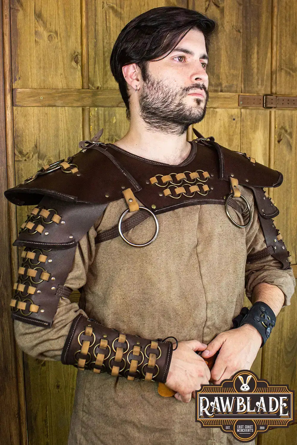 Fighter Gorget with Pauldrons worn by a model, featuring high-quality leather and copper color rings.