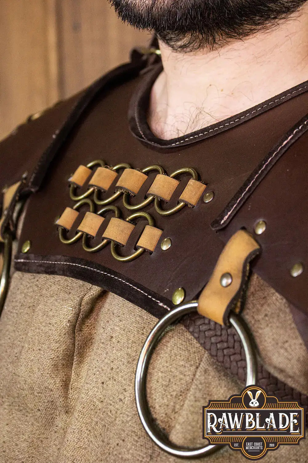 Fighter Gorget with Pauldrons worn by model, showcasing high quality leather and copper color rings.