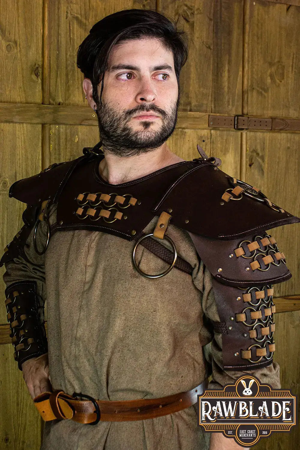 Fighter Gorget with Pauldrons worn by a man, showcasing high-quality leather and copper color rings.