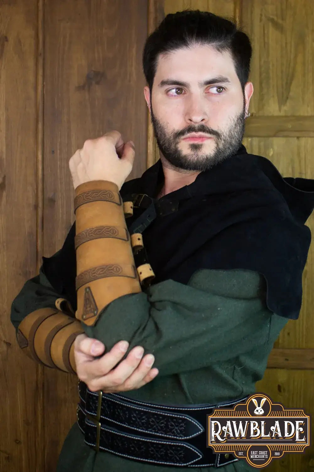 Model showcasing Bormund Bracers made of high-quality leather, enhancing medieval style with durable accessories.