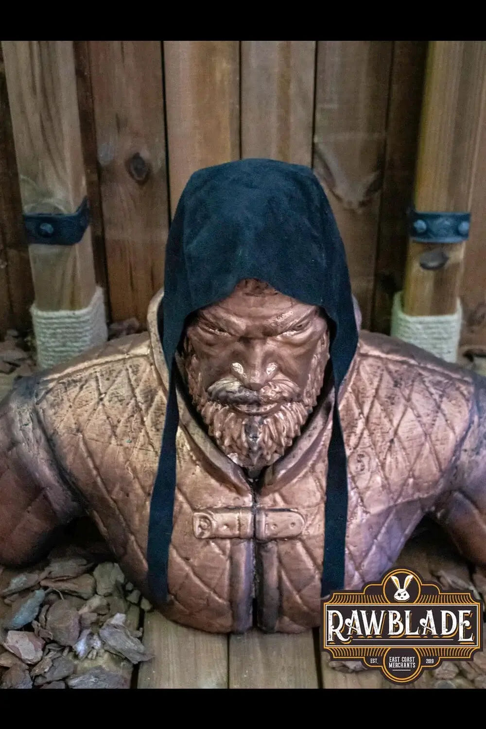 Barbadok Leather Coif worn by a statue, showcasing its high-quality split leather design.