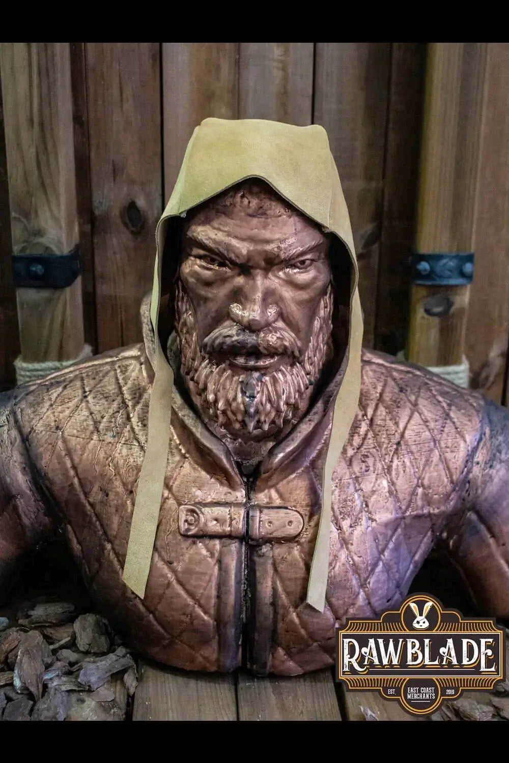 Barbadok Leather Coif displayed on a sculpture, showcasing its unique design and high-quality craftsmanship.