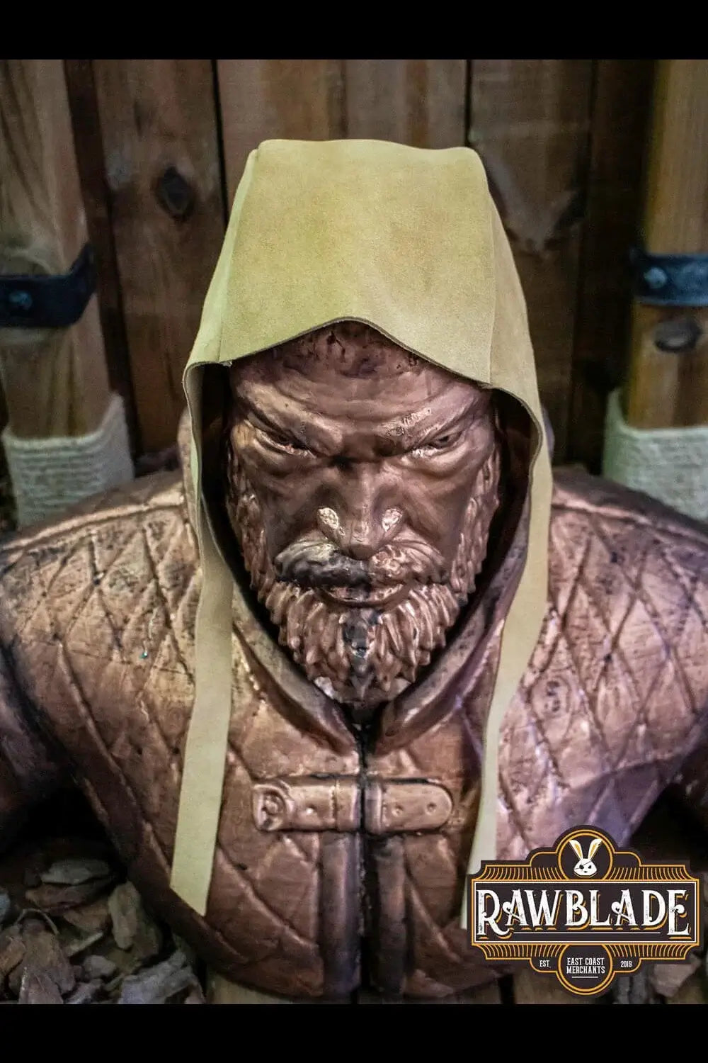 Barbadok Leather Coif displayed on a statue, showcasing its quality and design from Rawblade.