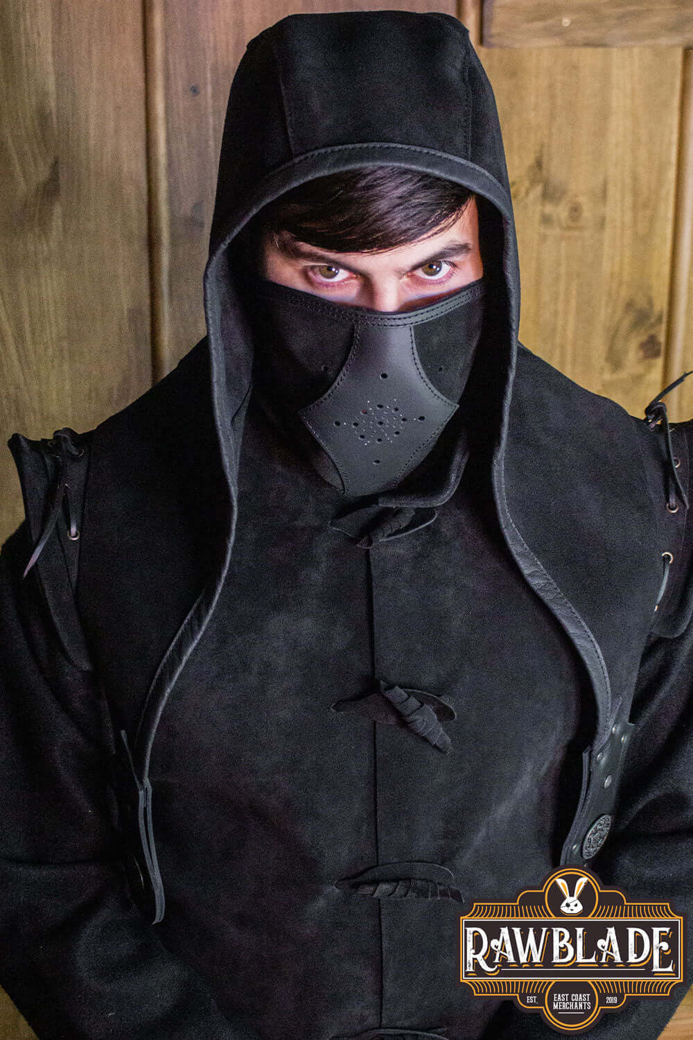 Akku Splitleather Hood worn by a model, featuring a stylish design and unique leather details.