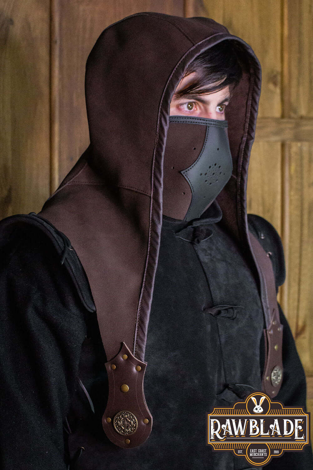 Akku Splitleather Hood worn by a character with a mask and leather accents, showcasing its elegant design.