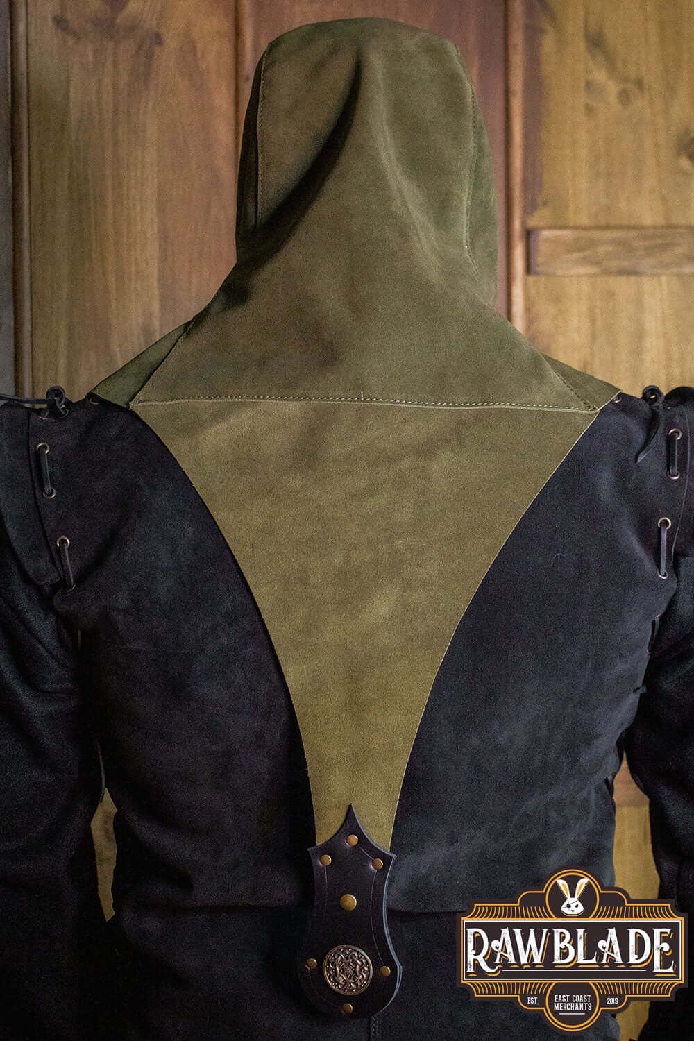 Akku Splitleather Hood featuring an elegant design with leather reinforcements and a unique hood.