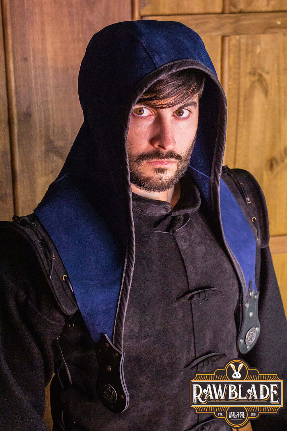 Akku Splitleather Hood worn by a male model, showcasing its unique design and elegant finish.