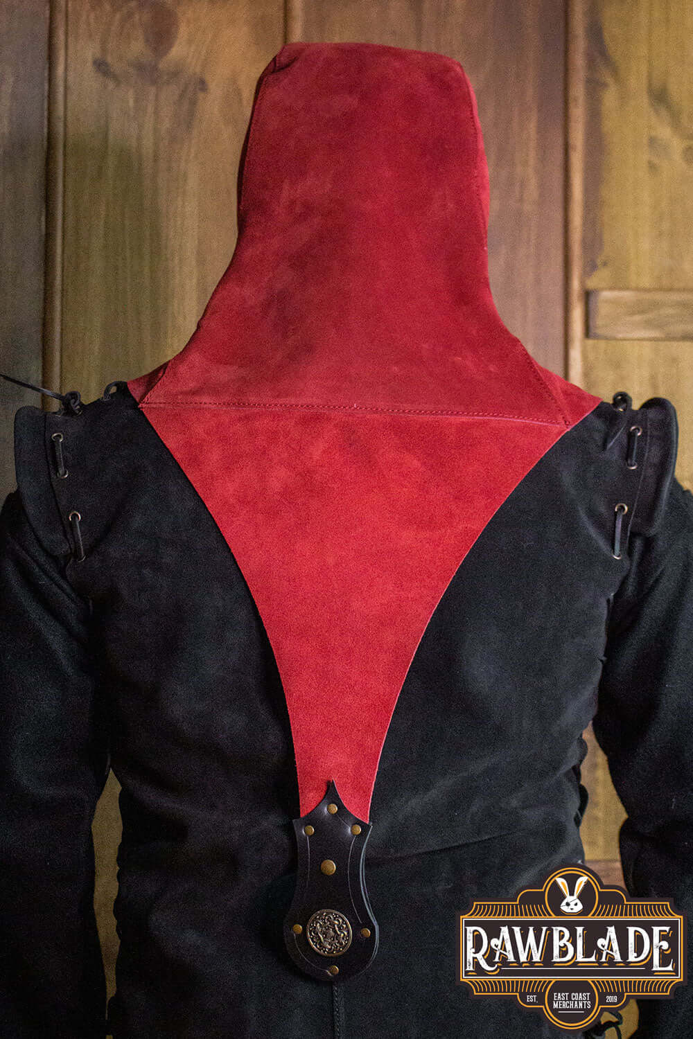 Back view of Akku Splitleather Hood showcasing the red suede and elegant metal ornaments.
