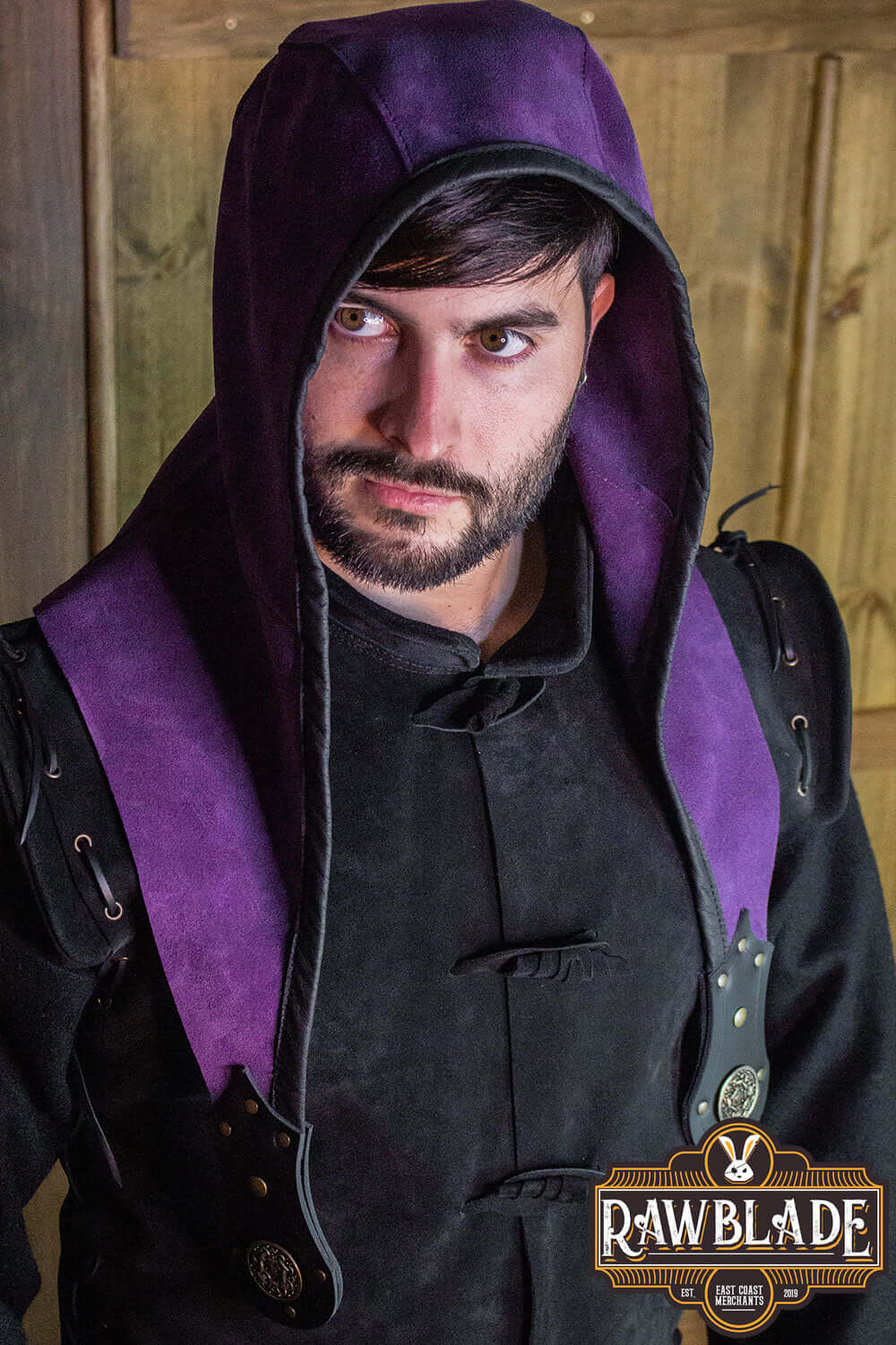 Akku Splitleather Hood worn by a model, featuring a purple inner lining and leather accents, perfect for various characters.
