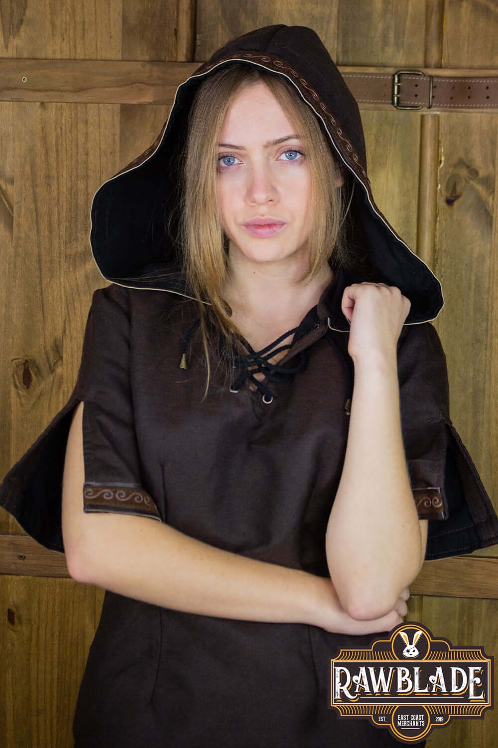 Briannan Ranger Tunic in dark brown with wide hood and short sleeves, featuring leather and suede trims.