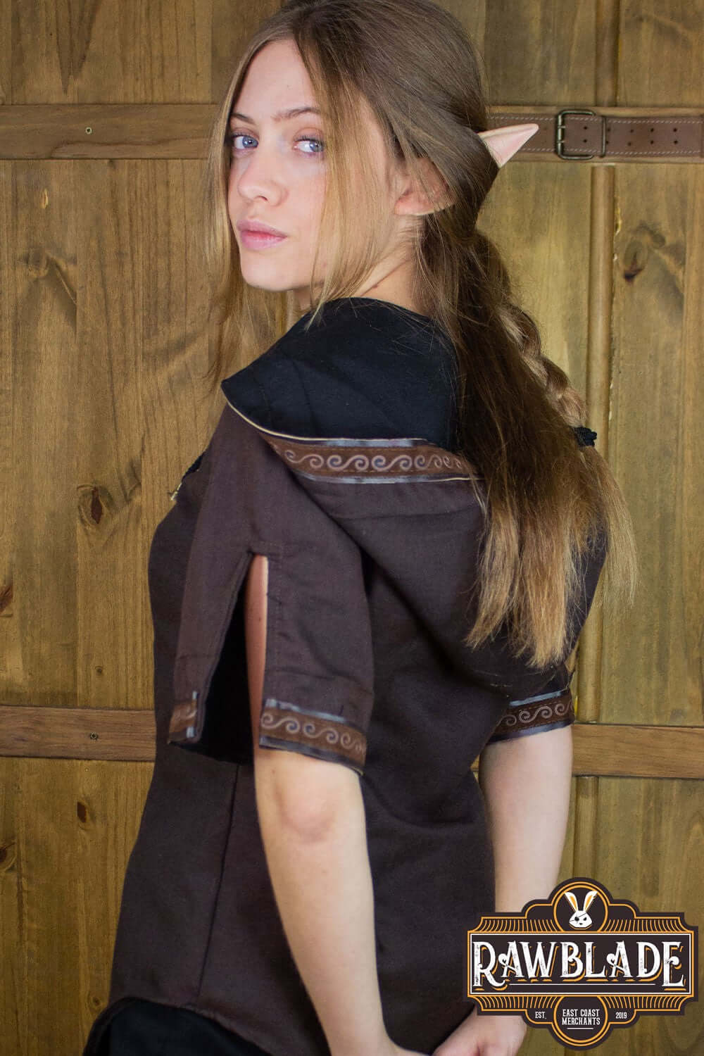 Briannan Ranger Tunic featuring twill fabric, wide hood, and leather-sueded trims on short sleeves.