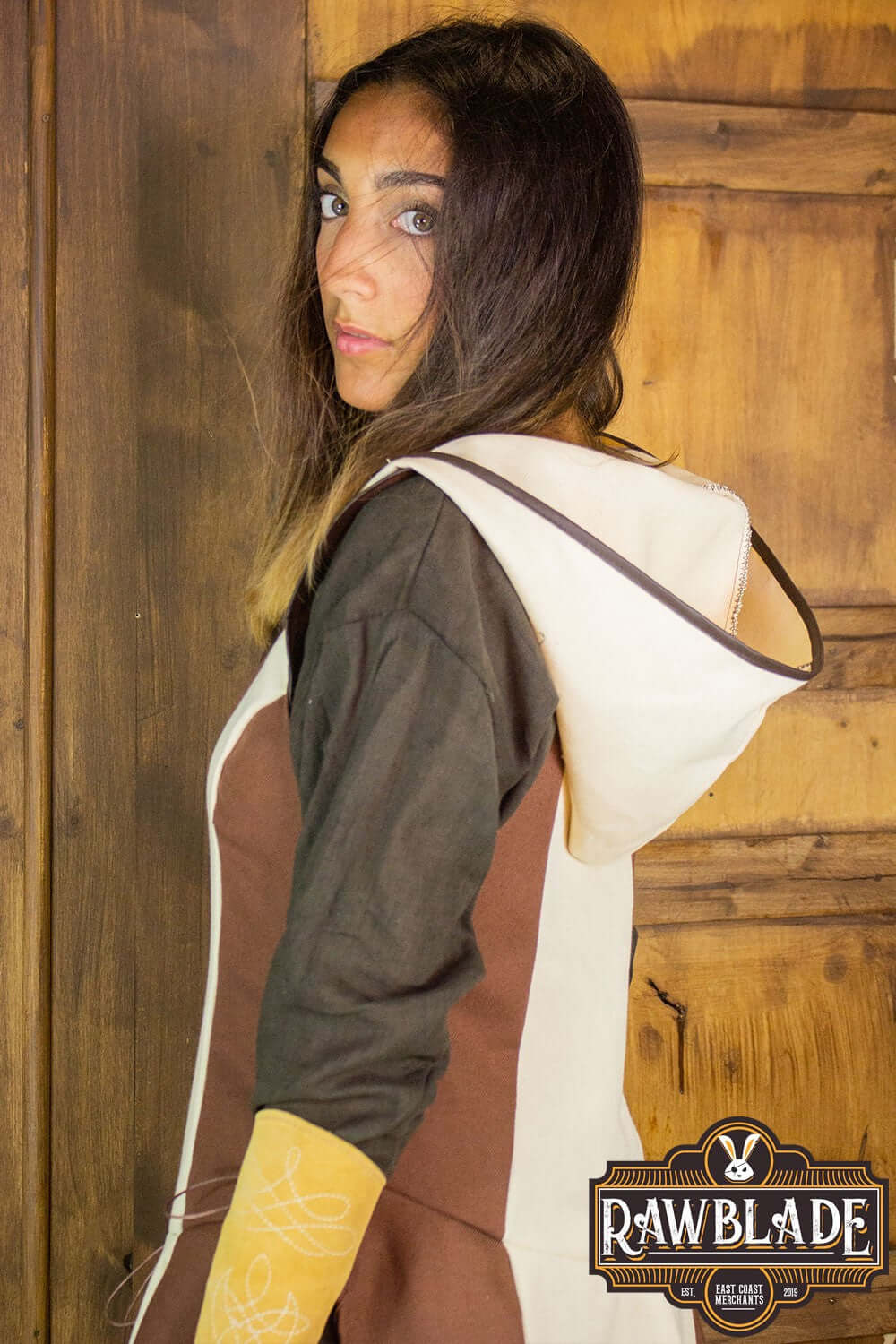 Arylith Archer Cotton Tunic worn by a model, showcasing its elegant design and wide hood detail.