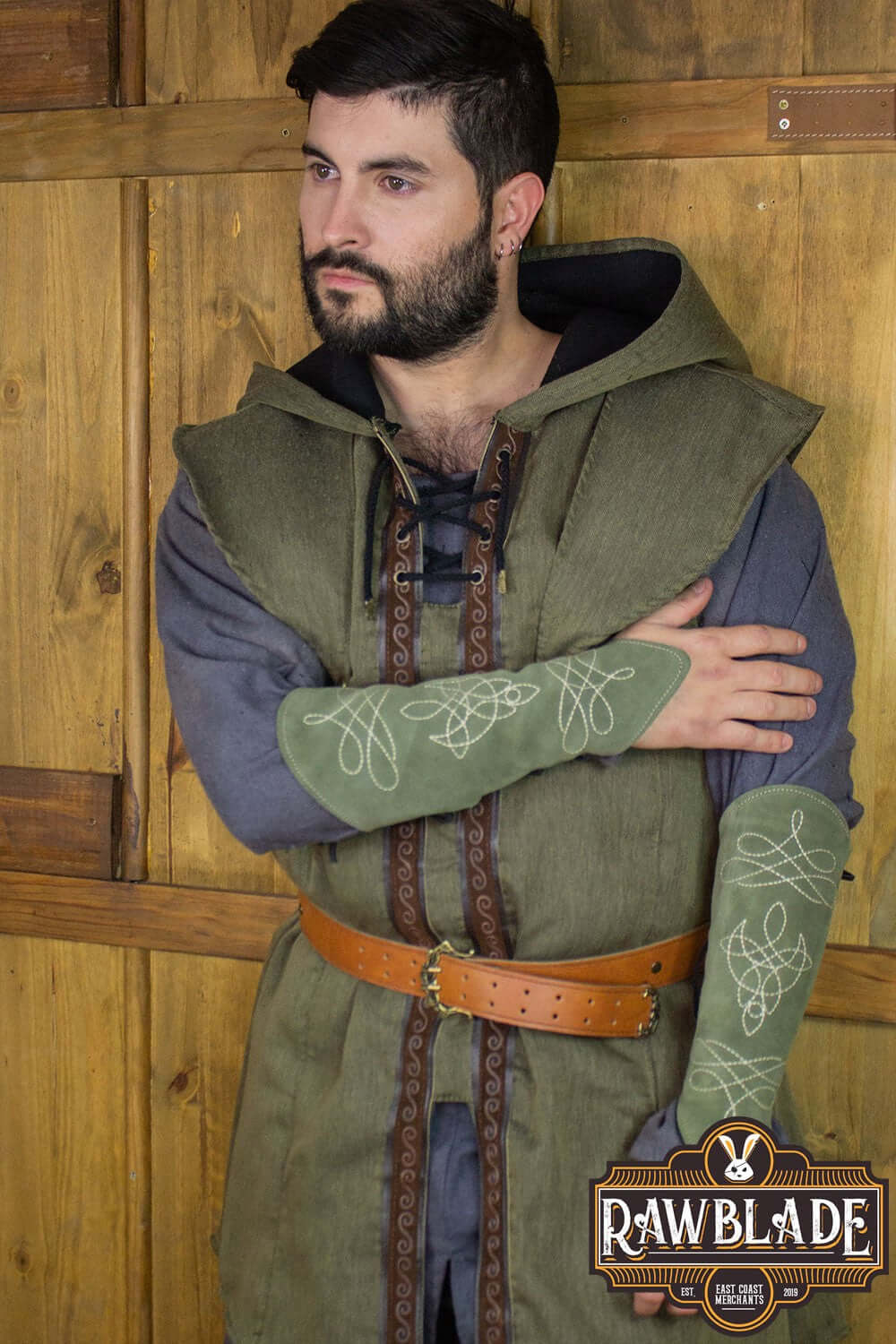 Karanthir Tunic worn by a young man with a hood, ideal for wizards and trackers, from Rawblade.