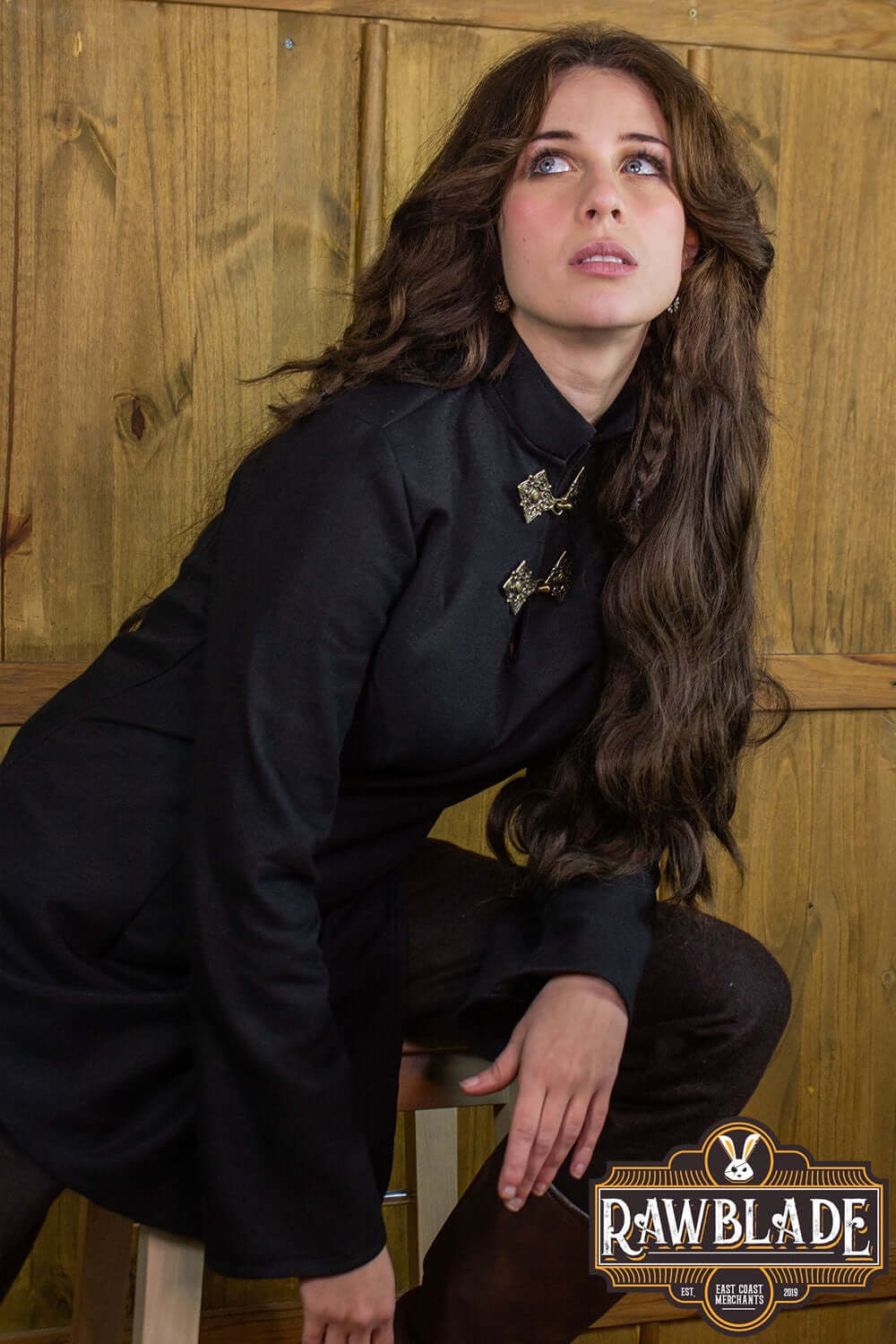 Astherii Tunic model showcasing the unique design with flared sleeves and high neck from Rawblade.