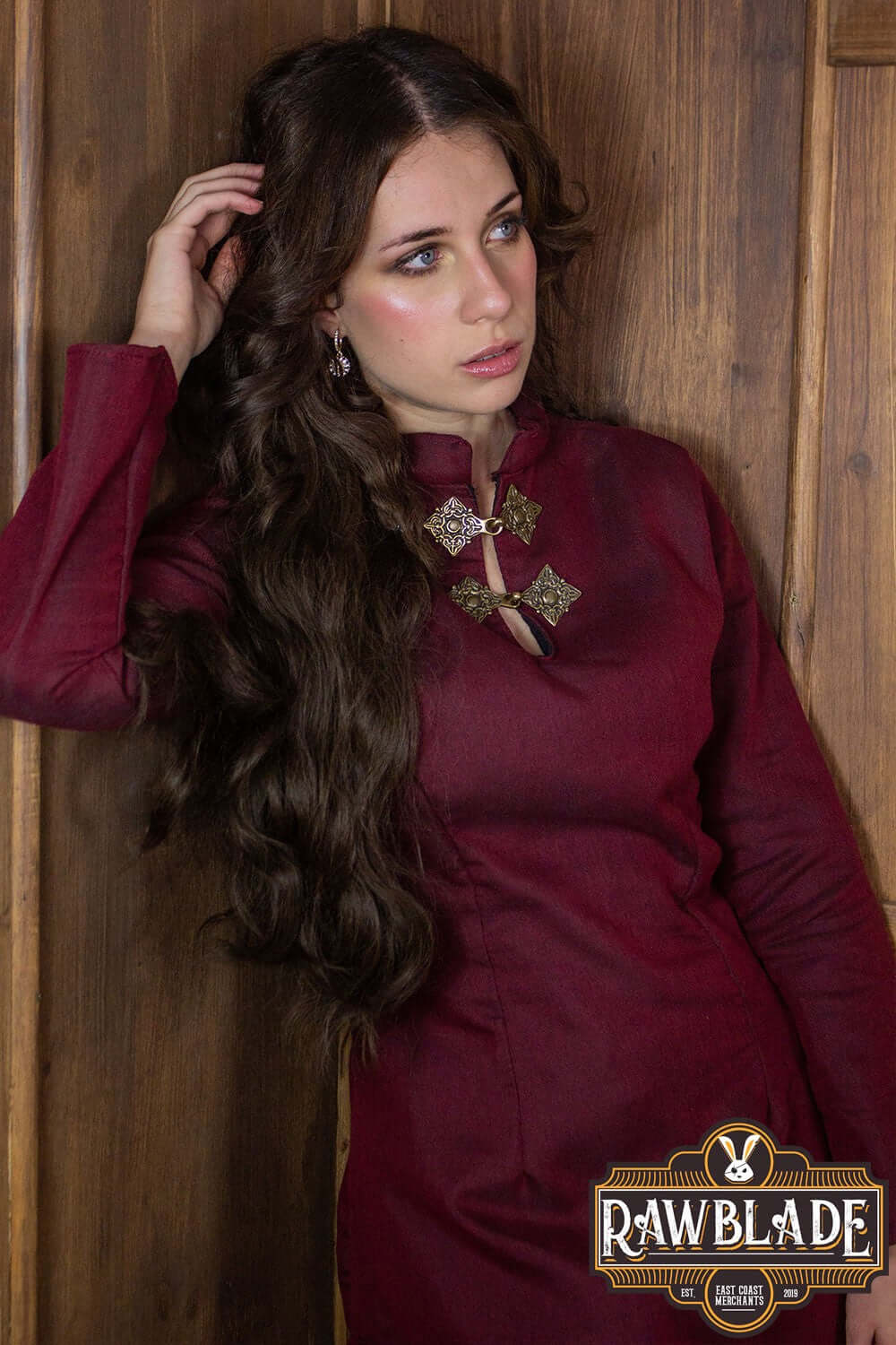 Astherii Tunic worn by a model, featuring long flared sleeves and a high neck, perfect for LARP enthusiasts.