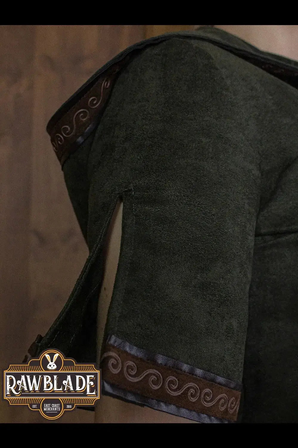 Briannan Ranger Tunic Suede showing the suede fabric and stylish leather trims on the short sleeves.
