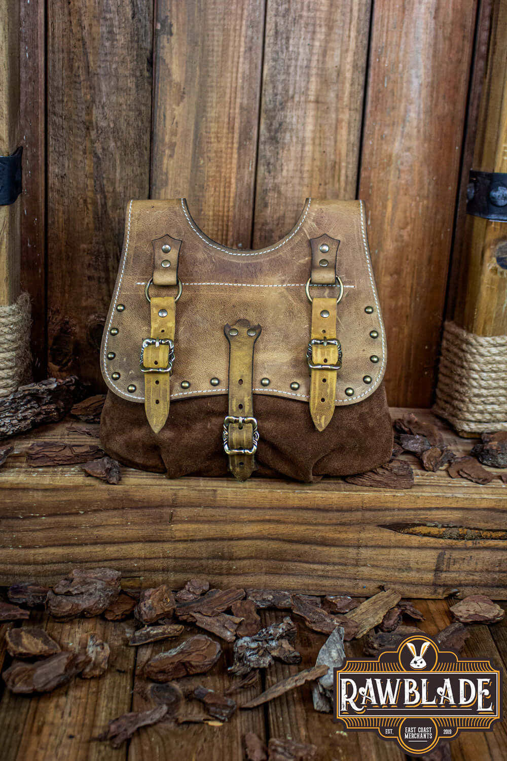 Agor Belt Bag made from two types of leather, featuring buckles and studs, ideal for wearing on belts or shoulders.