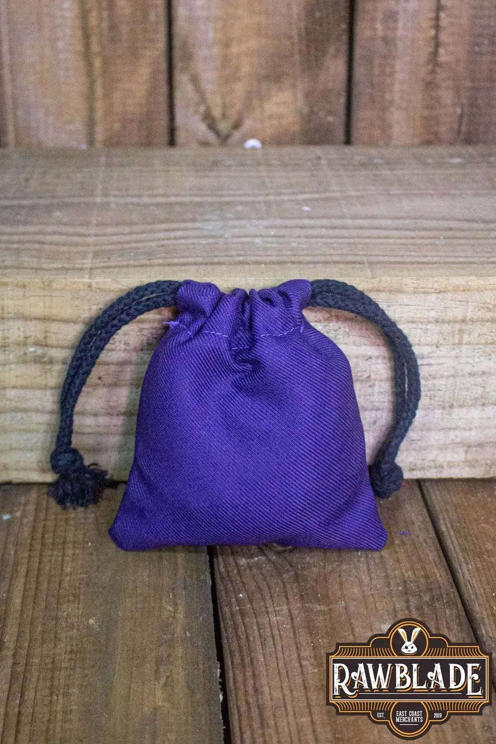 Timber Pouch Premium in purple cotton with black drawstrings, perfect for unique storage needs.