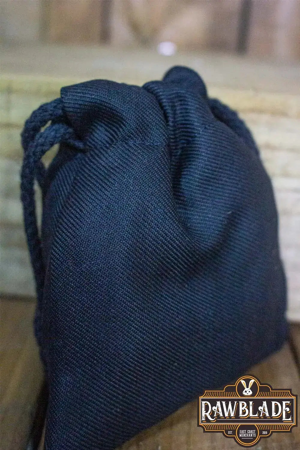 Timber Pouch Premium in black cotton with panama-style fabric, showcasing quality craftsmanship from Southern Spain.