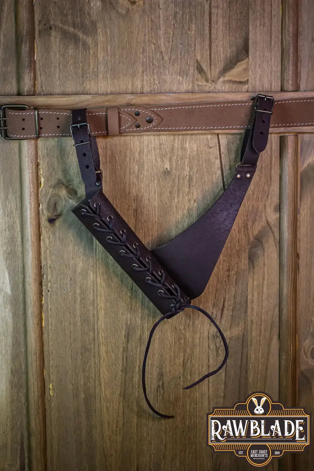 Breda Rapier Holder Small made of high quality cow leather with adjustable buckles, displayed on a wooden background.