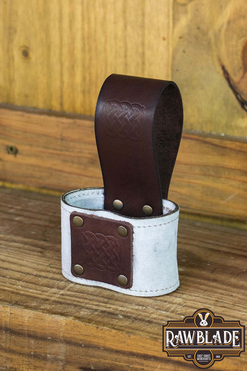Wanderer Holder featuring Celtic designs in high-quality leather with stitched borders and old gold rivets.