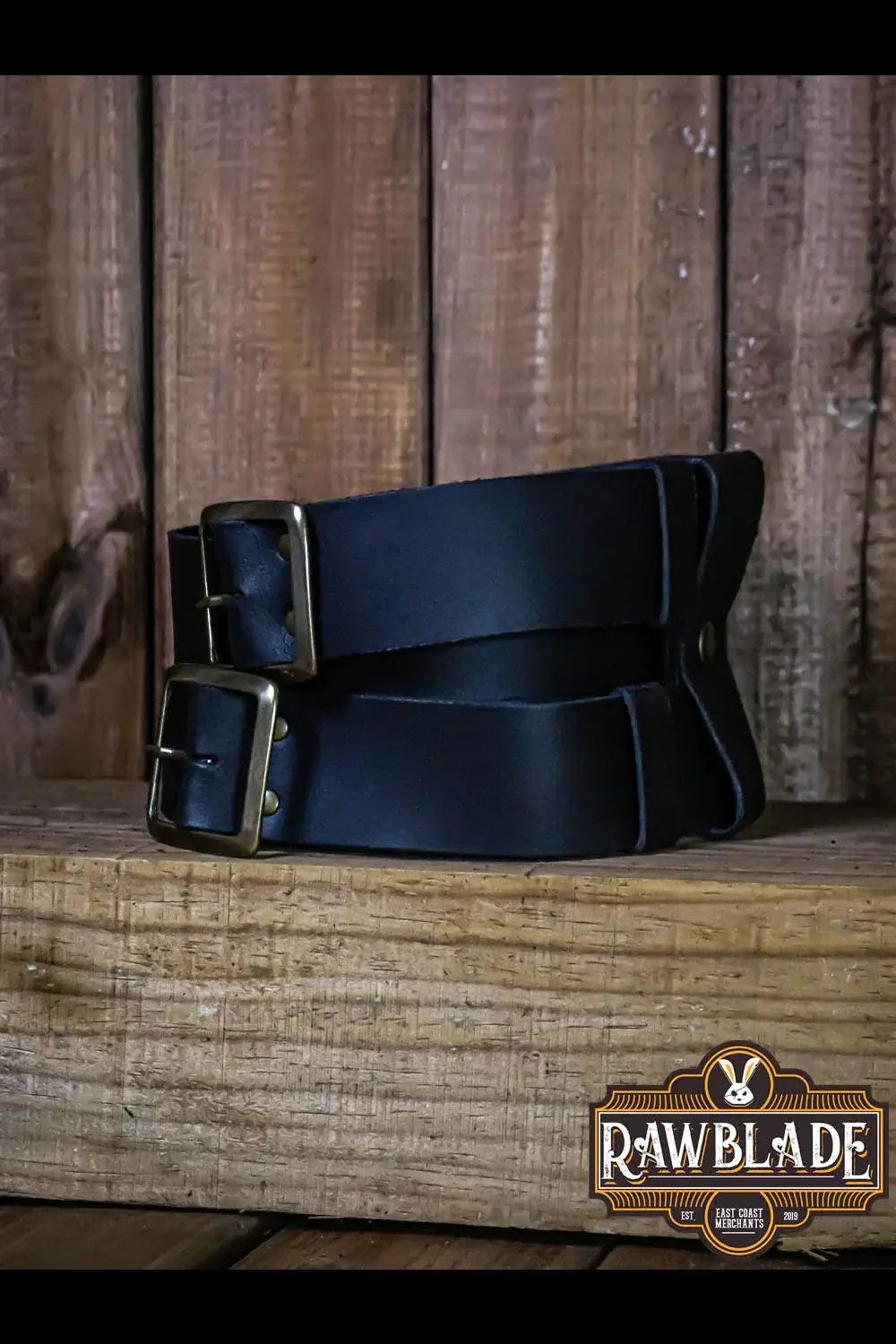 Beligor Double Belt showcasing high-quality leather with double buckle design on a wooden background.