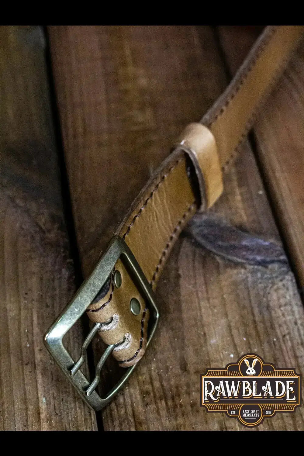 Close-up of the Adventurer Belt showcasing its cowhide leather, medieval buckle, and unique texture.