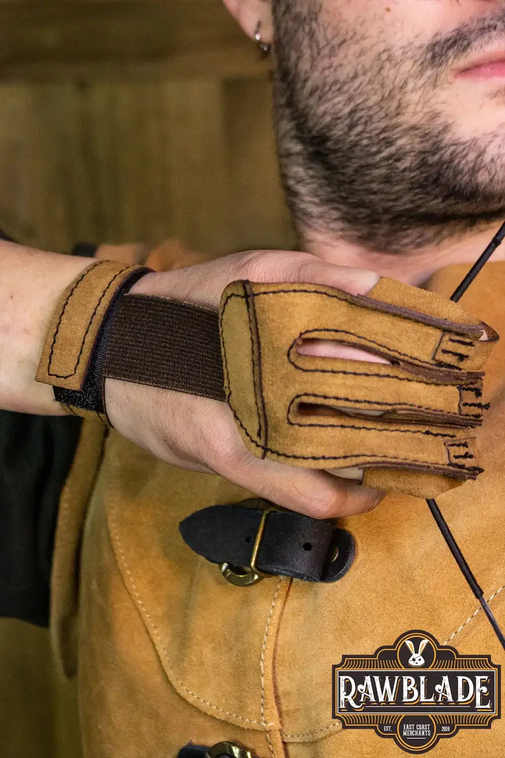 Close-up of Archery Glove Kane showing high-quality split leather and adjustable velcro wrist strap.